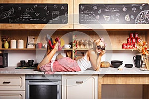 Woman Take A Rest On The Kitchen photo