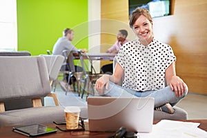 Woman Taking A Break Working In Design Studio