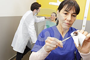 woman taking care or mirror in dental office