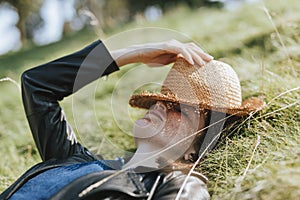 Woman taking a nap on the grass