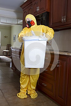 Woman taking our garbage can in Haz Mat photo