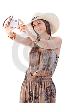 Woman taking photo at summer smiling
