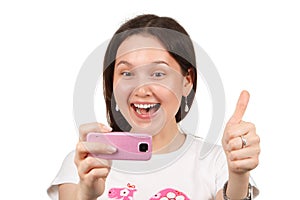 Woman taking a picture by cameraphone