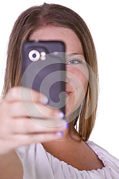 Woman taking pictures from her cell phone