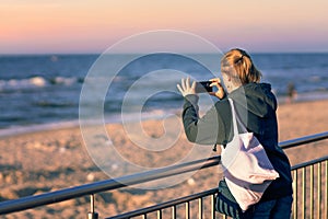 Woman taking pictures on holidays