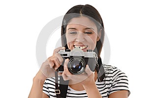 Woman taking pictures posing smiling happy using cool retro and vintage photo camera