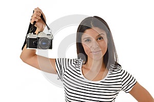 Woman taking pictures posing smiling happy using cool retro and vintage photo camera