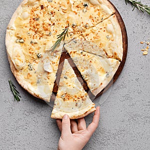 Woman Taking Piece Of Pizza Quattro Fromaggi