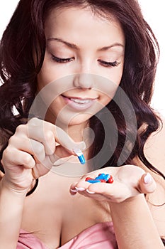 Woman taking pills