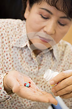 Woman Taking Pills