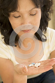 Woman Taking Pills