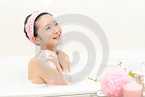 Woman taking relaxing bath