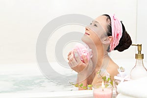 Woman taking relaxing bath