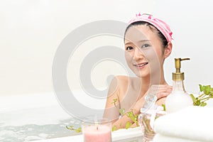 Woman taking relaxing bath