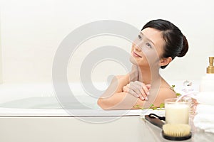 Woman taking relaxing bath