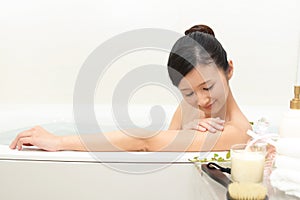 Woman taking relaxing bath