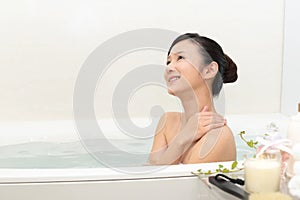 Woman taking relaxing bath