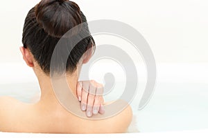 Woman taking relaxing bath