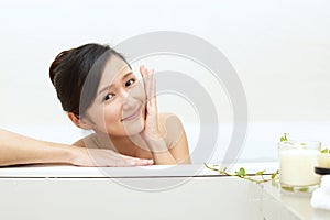 Woman taking relaxing bath