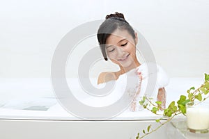 Woman taking relaxing bath