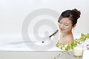 Woman taking relaxing bath