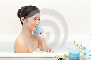 Woman taking relaxing bath