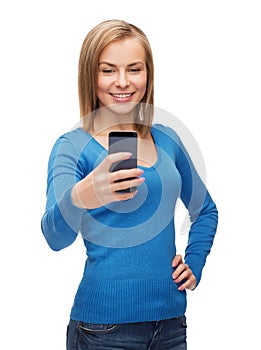 Woman taking self picture with smartphone camera