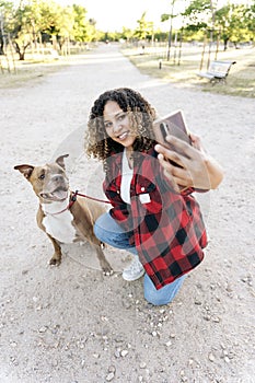 Woman Taking Selfie with her Dog