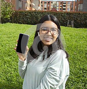 Woman taking a selfie photo with phone smiling