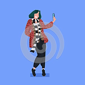 Woman taking selfie photo on smartphone camera casual female cartoon character standing pose flat full length blue