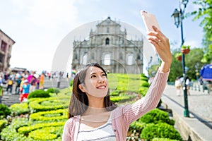 Woman taking selfie in St. Paul`s Church