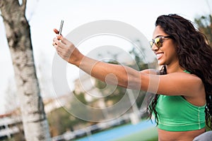 Woman taking selfies photo