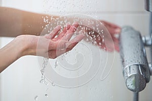 Woman taking a shower at home