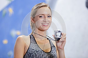 Woman taking time in gym