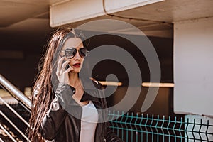 Woman talking on the phone.