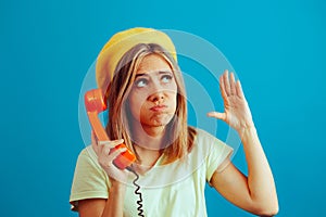 Woman Talking on the Phone Feeling Bored and Apathetic