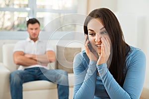 Woman talking privately on cellphone