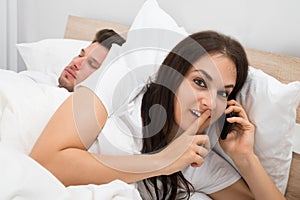Woman talking privately on cellphone