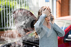 Woman Talking To Reliable Car Mechanic. Breakdown