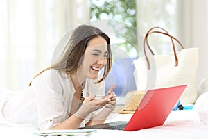 Woman talking in a video conference on summer vacations