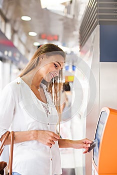 Woman tapping an access card