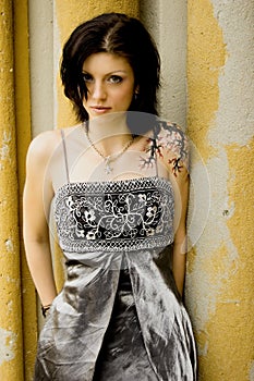 woman with tattoo in dress