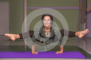 Woman teaching yoga