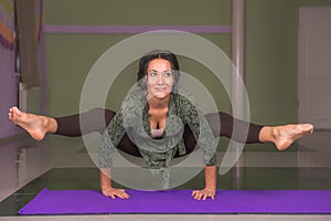 Woman teaching yoga