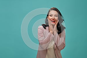 Woman on teal background
