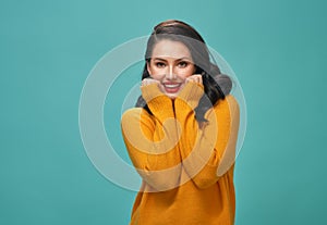 Woman on teal background