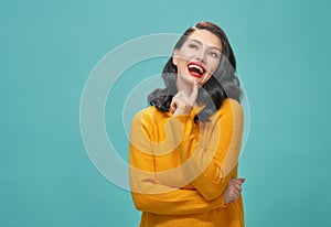 Woman on teal background