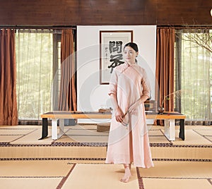 A woman with a teapot-China tea ceremony