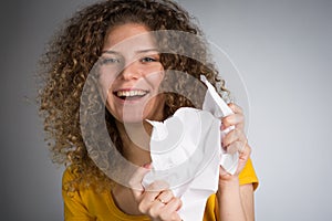 Woman tearing paper