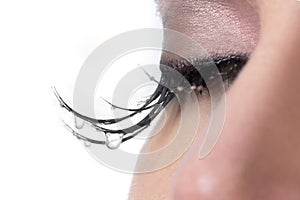 Woman With Tears Dripping from Her Eyelashes